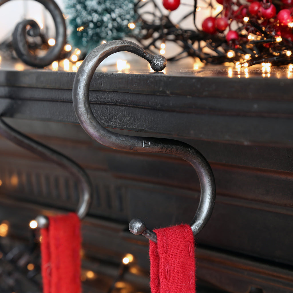 This classic forged iron Hook is ideal to hang your Christmas Stocking.