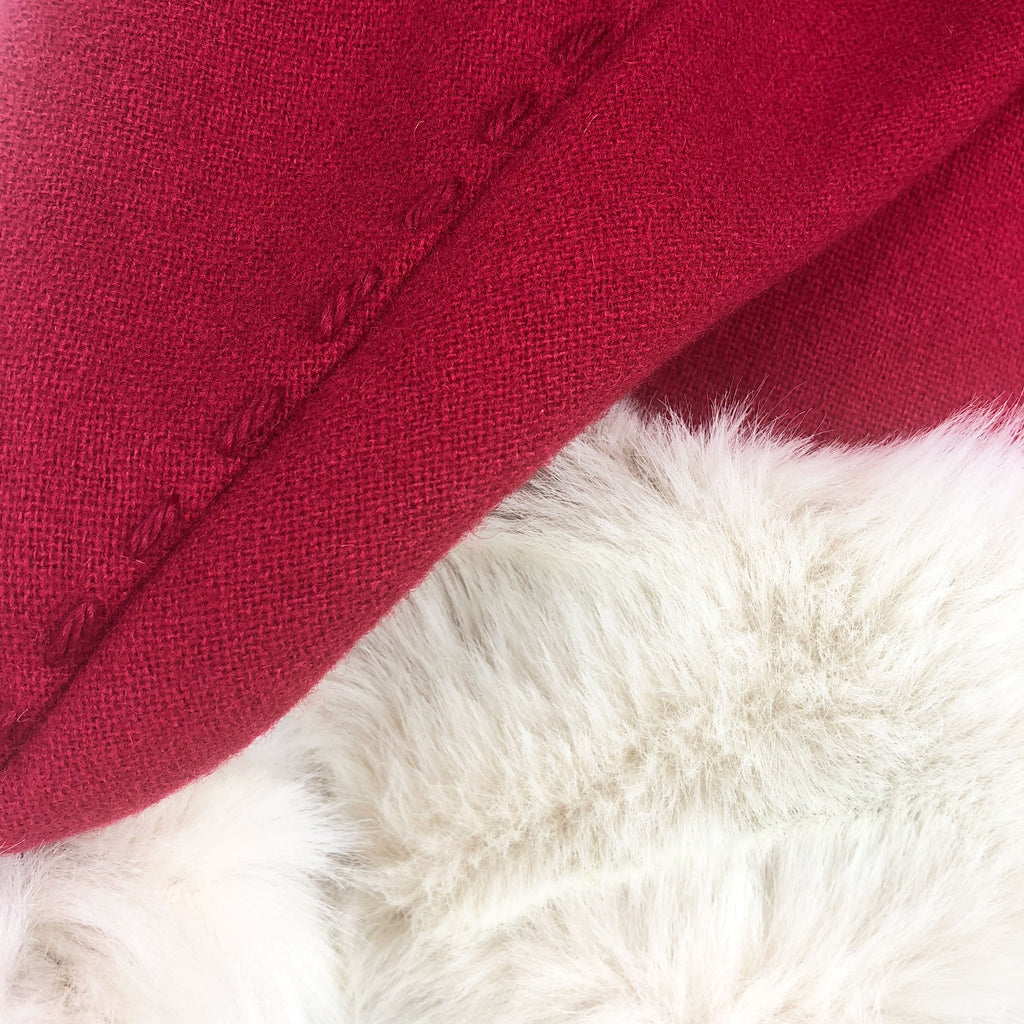 Hand-stitched details on the deluxe Christmas Hat.