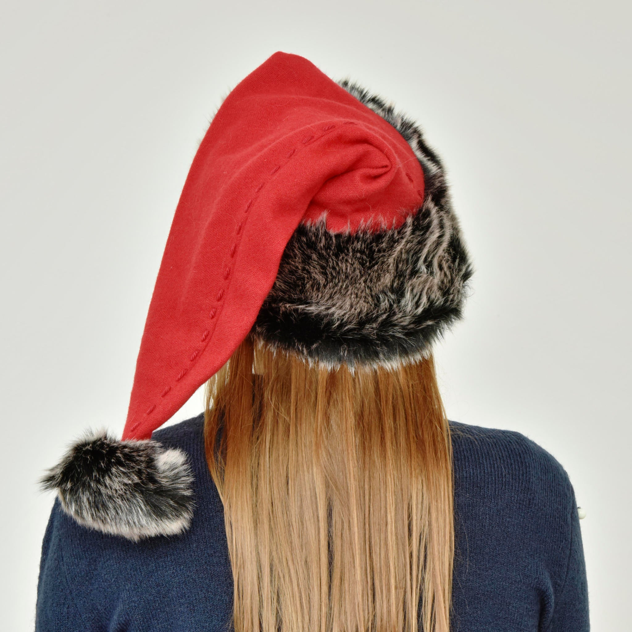 Handmade Santa Hat from pure merino wool and huggable black faux