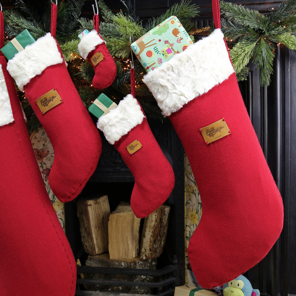 This is a large classy Christmas stocking is made from luxurious materials ideal as Christmas stocking for babies. 